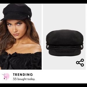 Black conductor / baker boy hat